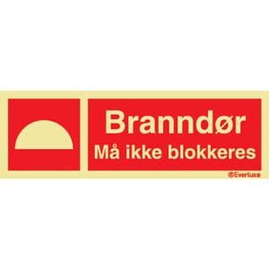 Branndør - "Må ikke blokkeres", 30x10 cm.